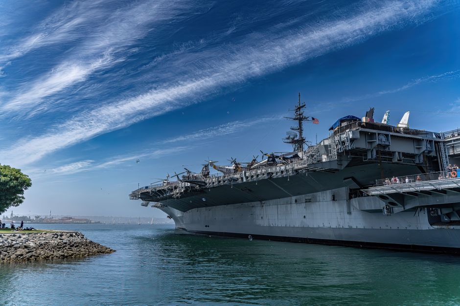 USS-Midway-Museum-ship-docked-in-San-Diego-harbor-on-a-clear-day–showcasing-naval-history.